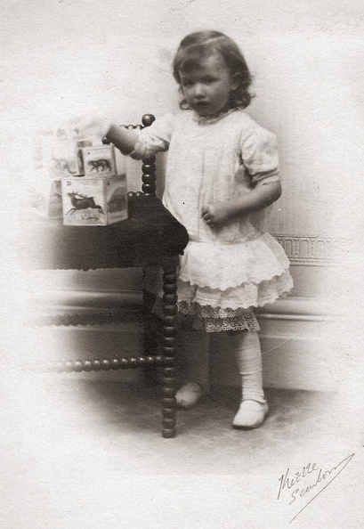 Anne with books - studio photo c.1921_a_1000h.jpg